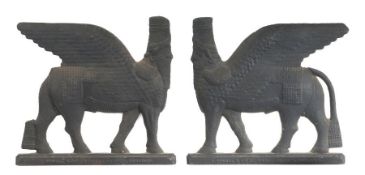 Pair of Victorian Howell & Co iron Phoenician sphinx mounts, the standing sphinxes with the