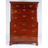 George III mahogany chest on chest, the swept pediment above two short and two long drawers