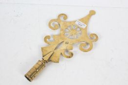19th century West Country Friendly Society brass pole head, of scroll design with a star to the