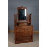 Early 20th century dressing chest, consisting of two short and two long drawers, the top decorated