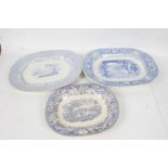 Three 19th/20th century blue and white porcelain meat plates, all depicting various landscape