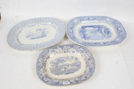 Three 19th/20th century blue and white porcelain meat plates, all depicting various landscape