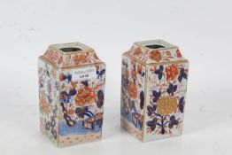Pair of Imari vases of cuboid form, both decorated with a floral design, 13.5cm high