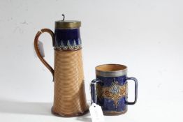 Royal Doulton stoneware ewer, with a pewter lid above a tapering ribbed body with a dark blue