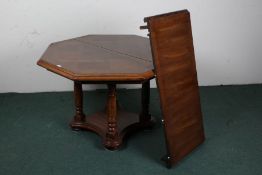 20th century oak hexagonal extending dining table, the hexagonal top above turned legs, 106cm by