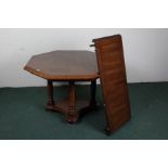 20th century oak hexagonal extending dining table, the hexagonal top above turned legs, 106cm by