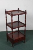 20th century mahogany three tier whatnot, set with three tiers with gallery's and turned supports