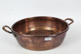 Large Victorian twin handled pan/pot of circular form, 49cm wide