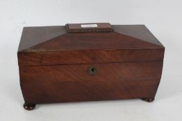 Victorian mahogany tea caddy, of sarcophagus form, the hinged lid enclosing a three section