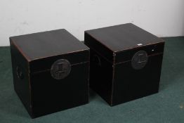Pair of Chinese black lacquered storage boxes, with metal carrying handles and escutcheons, 45cm