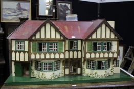 Vintage large Tri-ang dolls house, with a collection of furniture and accessories, the house 121.5cm