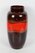 Large West German pottery lava vase, in red and brown glaze, 51cm tall
