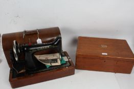 Singer hand sewing machine, housed in an oak case, together with an oak canteen (no contents) (2)
