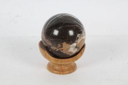 19th Century marble sphere on a modern wooden stand, 10cm high