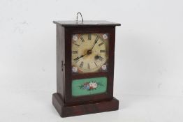 20th century mantle clock, with a cream dial and Roman numerals with a hand painted glass panel