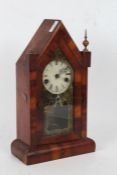 20th century mahogany cased mantle clock of architectural arched form, with a white dial and Roman