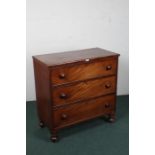 Victorian mahogany chest of drawers, consisting of three long graduating drawers, raised on turned
