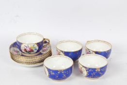 Derby porcelain hand painted tea set consisting of five cups and saucers with a blue and gilt ground
