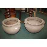 Pair of reconstituted garden urns, with scrolled handles, 42cm wide