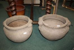 Pair of reconstituted garden urns, with scrolled handles, 42cm wide