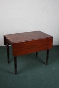 Victorian mahogany pembroke table, the rectangular top above turned legs, 92cm wide 73cm high