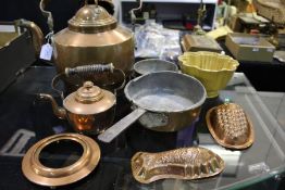 Collection of copper, to include a large kettle, moulds, saucepans and a stoneware mould (qty)
