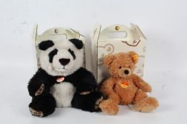 Steiff panda and a Steiff teddy bear, both with original boxes (2)