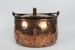 19th century copper cooking pot, with iron swing handle, 42cm wide