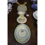 Clarice Cliff Bizarre 'Crocus' saucer dish, together with a Clarice Cliff trio, and small plate,