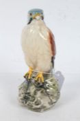 Royal Doulton whisky decanter, in the form of a kestrel, with contents, 17cm tall