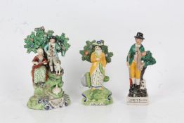 19th century Staffordshire pearlware figure group of Songsters, each beneath a bocage, 21cm tall,