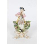 19th century Samson Chelsea porcelain figure of a young boy playing a flute, Golden Anchor marks