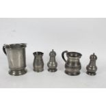 Collection of various pewter items to include measures and pepperettes, some baring various marks