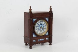 Early 20th century oak and porcelain mantle clock, the blue and white porcelain dial with arabic