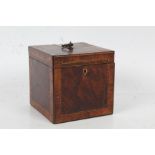 George III Tulipwood and mahogany cross banded tea caddy of cube form, the lid opening to reveal a