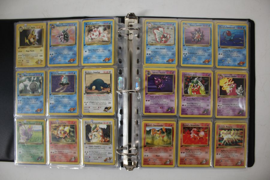 A collection of 1st Edition Gym Heroes Pokémon cards housed in a folder. To include a full non - Image 3 of 3
