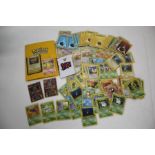 A collection of Pokémon cards to include Ancient Mew Promo cards, Zapdos #15 and Blaine's Charmander
