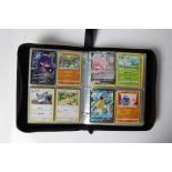 A collection Pokémon cards housed in a Pikachu folder. (Unverified)