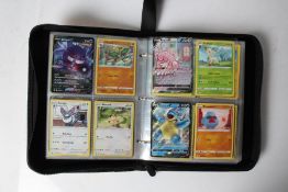 A collection Pokémon cards housed in a Pikachu folder. (Unverified)