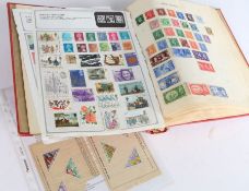 Stamps, British Empire, mid 20th Century, housed in a red album