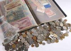 A collection of Worldwide coins and banknotes, the coins to include USA, Italy, Germany, Cameroon,