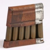 Rare charging clip of six Swiss made 6.6 x 55 rounds for the K31 6.5mm rifle, steel cases with