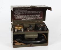 Second World War British Field Telephone D Mk V, together with a cased signal lamp with morse key,