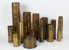 Selection of large calibre brass shell cases including, German 15 cm dated 1916, 90 mm, 25 Pdr, 77