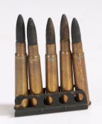 Clip of five .303 rounds with wooden bullets, for use as movie props, headstamp Kynoch Bren, inert