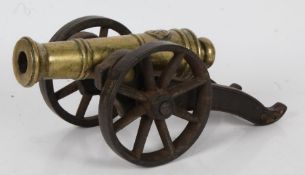 A 19th Century Signal Cannon, ringed brass barrel with flared muzzle,  large seal before the touch