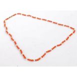 Coral and pearl necklace, the necklace set with coral beads intersected with pearls set on a 9 carat