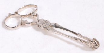 Pair of George II silver sugar tongs, London, maker Henry Plumpton, the scissor action tongs with
