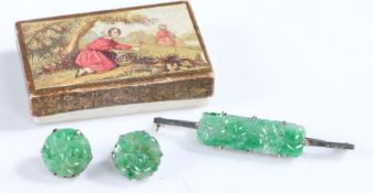 Suite of jade and white metal jewellery to include a bar brooch set with a rectangular carved jade