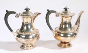 Elizabeth II silver coffee pot and hot water jug, Sheffield 1960, maker Walker & Hall, with ebony